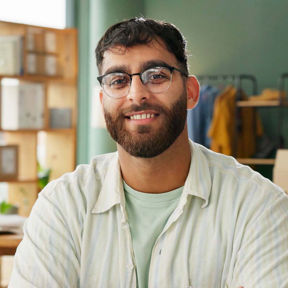 man portrait and laptop for ecommerce small busin PRHQQNM